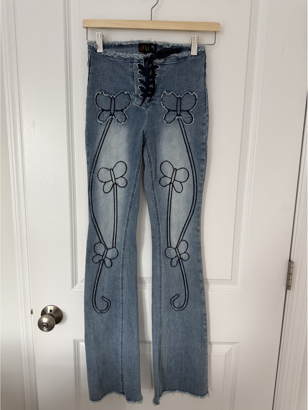 Light Wash Denim Pants with Butterfly Embroidery and Lace-Up Front Detail